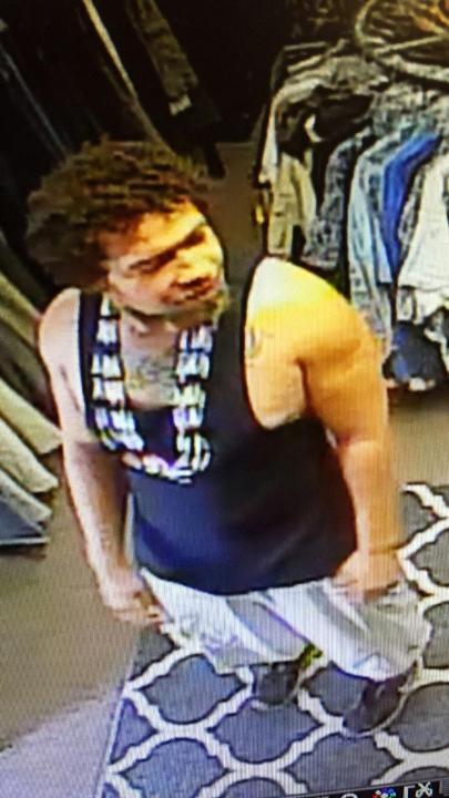 person of interest. male. dark hair. tan complexion